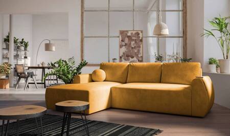 Ecksofa mit Schlaffunktion Colio gelb links stilvolles Ecksofa mit interessanter Form Veloursstoff Zierkissen Ball