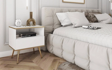 Luxuriöser weißer Nachttisch mit Schublade eleganter Design-Schrank mit Goldverzierung Schrank auf hohen Metallbeinen gestützt