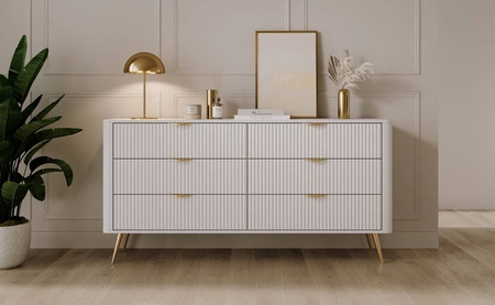 Schubladenkommode Lante 163 cm weiß elegantes Design ovale Form der Kommode auf hohen Beinen geschmackvoll geriffelte Front gesetzt