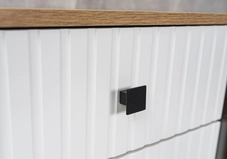 Schubladenkommode Senja 140 cm artisan Eiche / weiß elegantes Design dekorative kannelierte Front mit Metallgriff