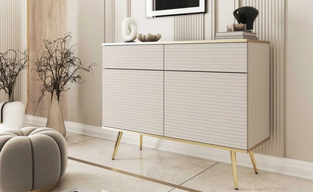 Kommode Luxury 107 cm beige stilvolle Kommode mit kannelierten Fronten Korpus mit goldener Zierleiste goldene Metallbeine gekrönt