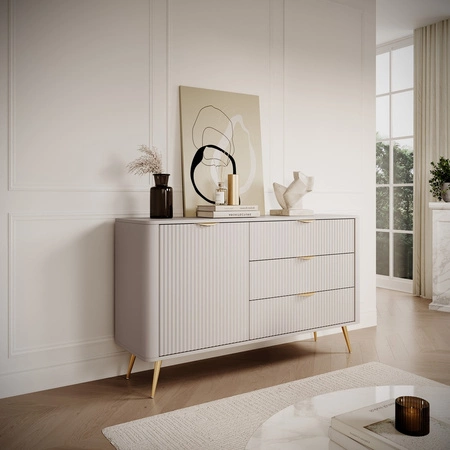 Lante Schubladenkommode 138 cm beige elegante abgerundete Kommode auf einem Metallsockel gestützt stilvolle Griffe