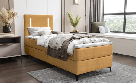 Boxspringbett Norco 90x200 gelb stilvolles Bett mit Bettzeug Lagerung Beleuchtung im Kopfteil fügt eine einzigartige Note