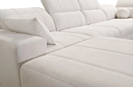 Ecksofa mit Schlaffunktion Penejos IV Lux Lachs linke Seite stilvolles Ecksofa mit bequemer ausziehbarer Fußstütze