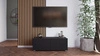 RTV Schrank Colder 100 cm schwarz mit Möglichkeit der Aufhängung stilvolle geriffelte Front elegante Form der Möbel in einem modernen Stil