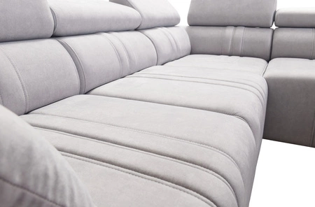 Ecksofa mit Schlaffunktion Castel IV rosa linke Seite stilvolles Ecksofa mit Bettzeugbehältern und verstellbaren Kopfstützen