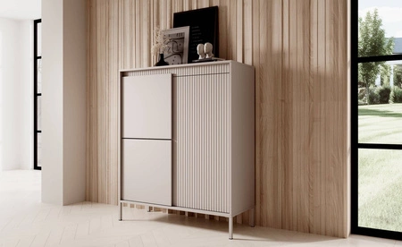 Kommode Sesti 104 cm beige Designerkommode mit originellem Design auf stabilem Metallsockel