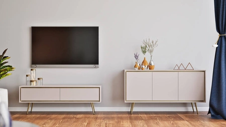 RTV-Schrank Nevea 150 cm beige eleganter Schrank in dezenten Farben originelle Dekoration für jedes Interieur stabile goldene Beine